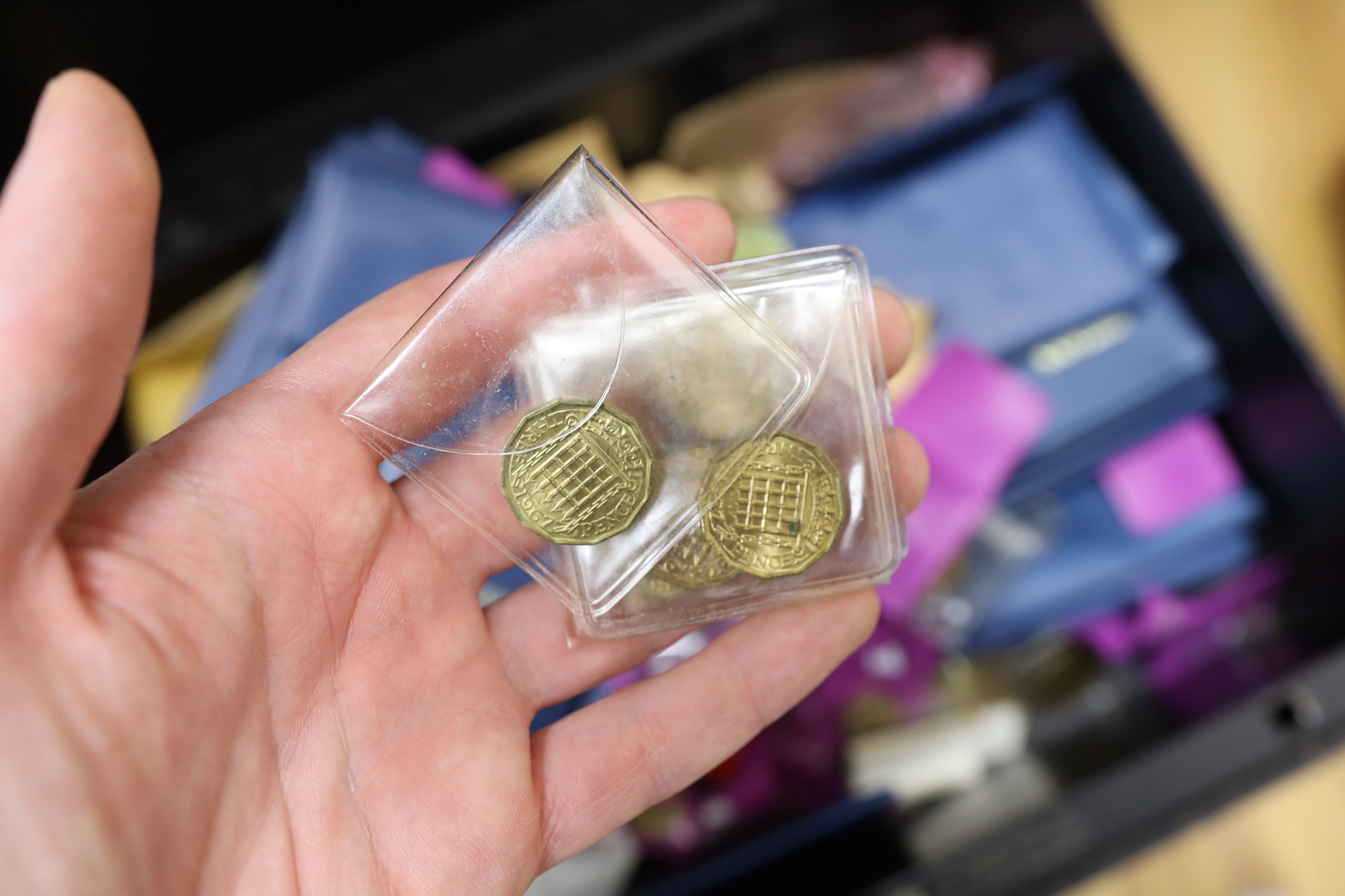 A large quantity of UK coins, mostly George V to Elizabeth II many UNC. in two metal boxes